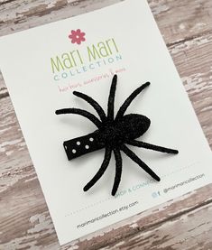 Do you love spiders??!! They are the perfect amount of creepy just in time for Halloween!  This listing is for one Glitter Spider Hair Clip The hair clip is the perfect size for clipping over a ponytail or as a side clip! Each one measures approximately 2.5 inches in diameter and secured on a grosgrain ribbon covered alligator clip.  It is available in 3 colors: black, orange and green Colors may vary due to different computer settings. All clips are partially lined and are heat sealed to prevent fraying.  All the ribbons used are heat sealed. Excellent quality and craftsmanship.  If you would love to be kept in the loop on new products, new designs, upcoming sales, contests, giveaways....or flash sales then please like us at www.facebook.com/MariMariCollection  And follow on Instagram: @m Spiders In Hair Halloween, Spider Hair Pin, Punk Black Hair Accessories For Halloween, Novelty Halloween Party Hair Accessories, Spider Hair Clip, Halloween Hair Clips, Halloween Accessories Hair, Halloween Hair, Halloween Spider