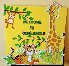 there is a sign that says welcome to our jungle with pictures of animals on it