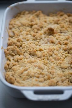 a casserole dish filled with food on top of a table