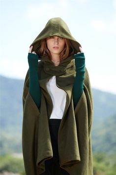 green wool cape cloak hooded poncho Hooded Wool Cape For Winter, Green Winter Cape Outerwear, Oversized Green Cape For Winter, Styling Moodboard, Fantasy Reference, Cloak Outfit, Winter Styling, Cape Cloak, Cashmere Cape