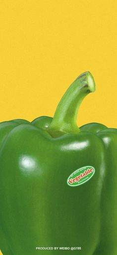 a green pepper is shown against a yellow background