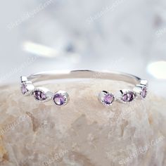 ★Band Material: Solid 14K/18K Rose gold/Yellow gold/White gold ★Accent Stone: 0.23caratNatural round cut amethyst ★Shank Width(Bottom): 1.5mm Personalization is available. It is handcraft finished and it will take about 2-3weeks to finish . Wearing occasion: Wedding, engagement, anniversary, Valentine's Day. Gift for girl friend, fiancée, wife, mother, grandmother. *Returns We provide 30days return and exchange service. (Custom order is made by Unique demand, will be non-returnable and non-refun Adjustable Purple Birthstone Ring For Anniversary, Adjustable Purple Amethyst Ring For Wedding, Stackable Amethyst Jewelry For Anniversary, Stackable Amethyst Birthstone Ring For Anniversary, Adjustable Amethyst Wedding Ring In Fine Jewelry Style, Adjustable Amethyst Ring With Accent Stones For Wedding, Adjustable Fine Jewelry Amethyst Ring For Wedding, Adjustable Amethyst Ring For Wedding, Purple Amethyst Open Ring For Anniversary