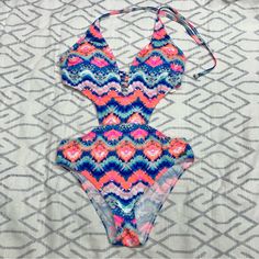 Brand New Without Tags. Lascana One Piece Swimsuit. Halter Tie Neck. Cutout Sides. Removable Bra Pads. Bright Tropical Print Multicolor Halter Neck Bodysuit For Beach, Multicolor Halter Neck Bodysuit For Vacation, Pink Printed One-piece Swimsuit, Pink V-neck One Piece For Beach Season, Multicolor Lined Bodysuit For Vacation, Pink V-neck One-piece For Beach Season, Pink Halter Neck Bodysuit For Vacation, Pink Printed One Piece For Vacation, Multicolor V-neck Bodysuit For Vacation