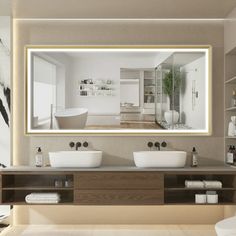 a bathroom with two sinks and a large mirror on the wall above it's counter