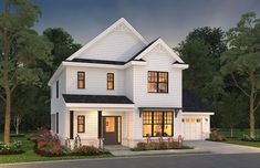 a white two story house with lots of windows on the front and side of it