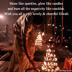 a man lighting candles in the dark with words on it saying shine like sparkles, glow like candles and burn all the negativity like crackles