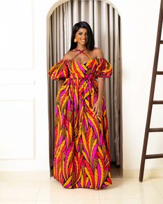 The Amaka maxi dress is a seamless blend of Afrocentric with modern style! The print and design makes it phenomenal and perfect for every occasion. Each piece is meticulously handcrafted using 100% African wax cotton ensuring the highest quality and authenticity. At our shop, we take pride in creating custom designs ta Printed Ankara Maxi Dress, Multicolor Printed Maxi Dress In Ankara Fabric, Multicolor Printed Ankara Maxi Dress, Bohemian Multicolor Ankara Maxi Dress, Plus Size African Fashion, African Print Maxi Dress, Skirt Jumpsuit, Jumpsuit Trousers, Couple Outfits