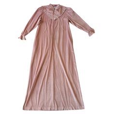 Step into retro comfort with this stunning 80s pastel pink velour long house dress sleep gown in size large. Perfect for lounging or a cozy night's sleep, this vintage gem features a soft, luxurious texture that flatters any figure. The pastel pink hue adds a touch of nostalgia and feminine charm to your wardrobe. Whether you're relaxing at home or hosting a vintage-inspired gathering, this gown will keep you stylish and comfy.  ○ Embroidered hem collar, long sleeves, with pockets,  front zipper, no lining ○ Brand: Vassarette ○ No material label ○ No size label, fits a size Medium-Large ○ Measurements (taken flat) pit to pit: 20" waist: 21" hips: 23" shoulder seam: 14.5" total length (from the back): 54" ○ Good pre-loved condition with some visible wear. There is a dark yellow stain on the Pink V-neck Nightgown For Lounging, Pink Vintage Sleep Dress, Vintage Pink Nightgown, 80s Pastel, Pink Casual V-neck Nightgown, Sleep Gown, Long-sleeved Pink Vintage Robe, Embroidered Hem, Cozy Sleep