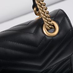 The ultimate It-Girl bag for any young woman with a love for luxury and a fashion forward sense of style. The Marmont bag is one of the most popular and in demand bags to come from Gucci. With the brand's signature matelassé leather design and prominent, antique gold tone GG logo and chain, this bag is the perfect example of a "simple statement" piece. Wear this bag with pretty much anything in your wardrobe, dress it up with a skirt and heels for more formal events, or dress it down with ripped Gucci Marmont Small, Simple Top, Gg Logo, Dior Shoes, Pink Suede, It Girl, Girls Bags, Exclusive Bag, Chanel Handbags