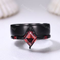 Natural Red Garnet Couple Ring Black Gold Matching Ring Set His and Hers Wedding Band Lozenge Cut Promise Ring For Men For Women Bridal Gift Men's ring: 5mm band width Women's ring: 7x9mm lozenge cut and 3x1.5mm baguette cut natural red garnet 1.2mm band width More style ring you can find in our shop: www.etsy.com/shop/PENNIjewel --------------------------------------- Size: US3-11 (If your ring size is lower than 3 or larger than 11,please contact me firstly. I will custom make this ring size for you.) ---------------------------------------------- Craft Period: All our items are handmade, pls allow me 2-3weeks to finish. Rush finish and rush delivery service are also available if you pay extra fee. When you need it, pls email me directly. Rush finishing listing:  www.etsy.com/listing/465 Black Ruby Anniversary Ring, Black Ring For Valentine's Day Formal Occasion, Black Rings For Valentine's Day Formal Occasion, Black Rings For Valentine's Day Formal Events, Formal Black Ruby Ring, Black Ruby Ring For Anniversary, Elegant Black Ruby Ring, Elegant Black Couple Rings For Gift, Elegant Black Couple Rings As Gift