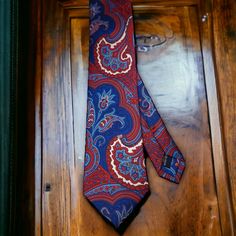 Treat yourself with a new pattern and splash of color to your look with this unique tie. 100% Micro Fiber Handmade Package Includes: Tie Length: 59" Width: 3" Warm iron if needed Blue Paisley Print Tie For Black Tie Events, Blue Paisley Print Ties For Black Tie Events, Blue Paisley Print Ties For Black Tie Occasion, Blue Paisley Print Standard Tie, Blue Paisley Print Tie, Patterned Fitted Standard Tie, Fitted Patterned Standard Tie, Paisley Tie, Unique Ties