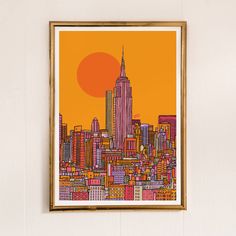 an orange and yellow cityscape with the sun setting in the sky above it