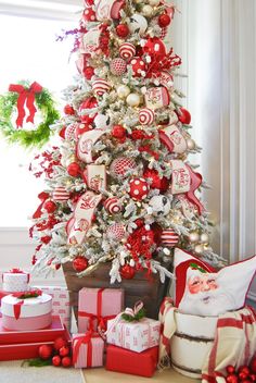 a christmas tree decorated with red and white ornaments