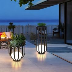 outdoor lighting on patio with ocean view at dusk