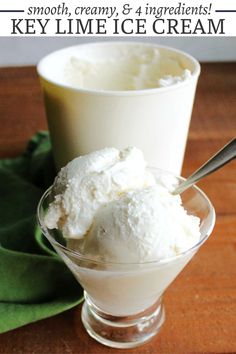 two glasses filled with ice cream on top of a wooden table