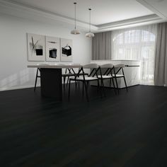 an empty dining room with black and white decor