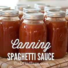 canning spaghettitti sauce in mason jars with the title saying canning spaghettitti sauce on it