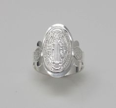 This Beautiful and Traditional Saint Benedict ring made from high-quality Sterling Silver 925 Its the perfect gift for anyone of any age and excellent for everyday wear. Item Specifications: Model # PAS2 Metal Type: Sterling Silver Metal Stamp: 925 Shape St. Benedict Style: Traditional Ring Front: 23mm (7/8 inch) Size: 6, 7, 8, 9 Stones: No * We only sell SOLID metals Stamp: 925 Sterling Silver. * We do NOT Silver plate our Jewelry - All jewelry comes in a gift box We will ship within 1-2 busine Adjustable Silver Rings For Commemoration, Classic Sterling Silver Rings For Commemoration, Commemorative Engraved Sterling Silver Ring, Silver Sterling Engraved Ring For Commemoration, Silver Engraved Ring Stamped 925 For Commemoration, Silver Oval Signet Ring For Commemoration, Commemorative Sterling Silver Rings, St Benedict Cross, Traditional Ring