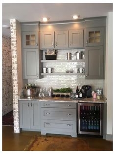 the kitchen is clean and ready to be used for wine tasting or as an entertaining area