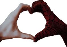 two hands making a heart shape with one hand and the other holding something in it