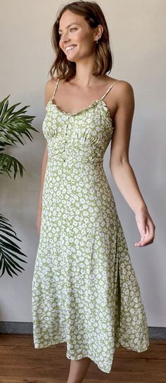 Light Green Fitted Casual Dress, Fitted Light Green Casual Dress, Green Printed Midi Dress For Garden Party, Garden Party Green Printed Midi Dress, Green A-line Midi Dress With Floral Print, Green Printed Midi Sundress, Trendy Green Sundress For Spring, Casual Light Green Mini Dress For Spring, Green Flowy Mini Dress With Square Neck