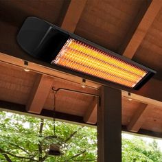 an outdoor heater sitting on top of a wooden roof