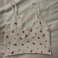 The Shirt Is A White Crop Top With Pink Small Flowers, It’s Very Soft And Comfy, Bought It In Forever 21, Never Worn. Cute White Tank Top With Floral Print, Trendy White Tank Top With Lace Trim, White Floral Print Tank Top For Brunch, Cute White Crop Top Tank Top, Cute White Crop Tank Top, Forever 21 White Crop Top For Brunch, Forever 21 White Tank Top For Spring, Forever 21 White Summer Crop Top, Forever 21 White Spring Tank Top