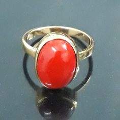 Birthstone Jewelry Custom Jewelry Ring metal is High Quality Solid 925 Sterling Silver Stone- Natural Red Coral Stone Shape- Oval Stone Size - 10x12 mm Stone Weight- 6.20 Carat Setting Type- Halo Bezel Ring Band- Gold Gems Stone Color- Red good looking small n shiny finished ring looks amazing design The humble ring has been about for years, older than any of us and still as important as ever. A symbol of eternal love, You can personalize it with your desired birthstone.This ring is perfect to w Spiritual Birthstone Ring For Formal Occasions, Dome Ring With Gemstone As Gift, Gemstone Dome Ring As Gift, Gemstone Dome Ring With Round Band As Gift, Gemstone Dome Ring With Round Band For Gift, Oval Spiritual Ring With Polished Finish, Oval Spiritual Rings With Polished Finish, Round Dome Ring With Gemstone As Gift, Oval Cabochon Ring With Stone Setting For Gifts