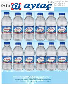 six bottles of water sitting next to each other