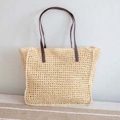 Elena Handbags Straw Woven Square Tote Elegant Beach Bag With Leather Handles For Vacation, Elegant Open Weave Crochet Bag For Vacation, Elegant Vacation Crochet Bag With Open Weave, Chic Open Weave Jute Bag, Elegant Woven Leather Straw Bag For Vacation, Elegant Woven Leather Beach Bag, Chic Woven Natural Fiber Bag, Chic Woven Bag Of Natural Fiber, Chic Straw Bag With Woven Leather Details