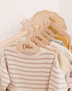 clothes hangers with personalized shirts on them