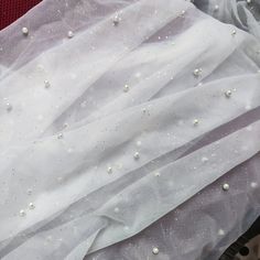 2-way Stretch Soft Sparkling Glitters Pearl Beaded Tulle Fabric ▶This listing is for 1 or 2 yards (If you order more than 1 quantity, we'll send them in one continuous piece) ▶Measurement (approx): 63" in width (160 cm) ▶Color: white ----------------------------♥-FabricTrims-♥-------------------------- There are more stock available. Please feel free to contact us if you have any question about our items. Thank you and enjoy your shopping! ♥ More beautiful fabric, trims, appliques and buttons he Soft Sparkling, Beaded Tulle, Bridal Veils, Dress Costume, Sparkles Glitter, Prom Gown, Tulle Dress