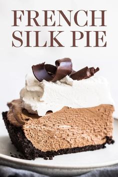 a piece of chocolate cheesecake with whipped cream on top and the words french silk pie above it