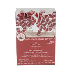 red and white striped lollipops in a box