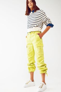 Introducing our Cargo Pants with Tassel Ends in Lime, a stylish and comfortable choice for a casual yet fashionable look. These ankle-length pants are designed to provide a relaxed and effortless fit. With a relaxed fit and straight leg, these cargo pants offer a laid-back style that is perfect for everyday wear. The comfortable fit allows for easy movement, while the straight leg design adds a touch of versatility. Crafted from stretch denim, these pants provide a comfortable and flexible feel.