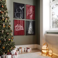 a christmas tree is in front of three framed pictures