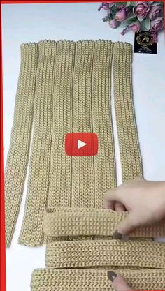 the video shows how to make knitted scarfs