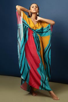 Multi-color kaftan with all-over abstract print and tie-up front.
Component: 1
Printed
Neckline: V Neck
Sleeve Length: Long
Fabric: Natural Crepe
Color: Multi Color
Tie-up drawstring - Aza Fashions Kaftan Women, Kaftan For Women, Printed Kaftan, Aza Fashion, Abstract Print, Multi Color, Saree, Sleeve Length, V Neck