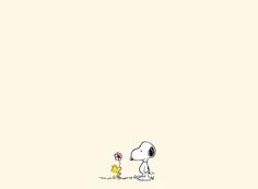 a cartoon character is holding a flower in his hand and looking at the snoopy dog