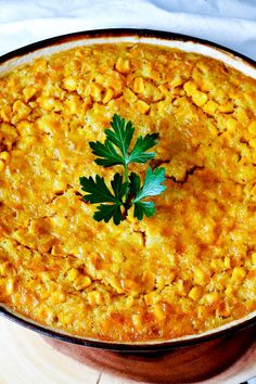 a casserole dish with some parsley on top