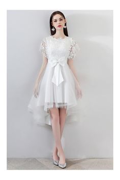 Shop Gorgeous White Tulle Homecoming Dress High Low with Big Bow online. SheProm offers formal, party, casual & more style dresses to fit your special occasions. White Knee-length Mini Dress For Wedding, White Mini Dress With Short Sleeves For Wedding, White Lace Short Sleeve Dress, White Lace Mini Dress With Short Sleeves, Confirmation Dresses White, Homecoming Dresses High Low, Confirmation Dresses, Dress High Low, Tulle Homecoming Dress