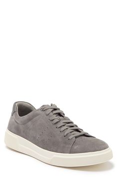 A low-top sneaker is textured with perforations and cushioned by a padded collar for all-day comfort. Leather upper/synthetic lining/rubber sole
 Imported Modern Gray Sneakers With Textured Sole, Modern Gray Low-top Sneakers, Gray Lace-up Sneakers With Perforations, Gray Low-top Sneakers With Perforated Toe Box, Classic Gray Sneakers With Textured Sole, Gray Plain Toe Sneakers With Rubber Sole, Modern Low-top Walking Shoes With Perforated Toe Box, Gray Leather Sneakers With Ortholite Insole, Gray Leather Sneakers With Speckled Midsole