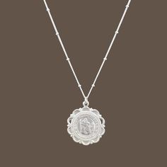 Protect yourself or a loved one with this stunning Saint Christopher Scalloped Necklace. This beautiful piece serves as a symbol of faith, protection, and guidance, making it the perfect gift for her or a meaningful present for First Communion or Confirmation. Whether worn daily or on special occasions, this medallion necklace is a constant reminder of one's spiritual journey and the importance of staying connected to one's faith while traveling. - Material:  high-quality 925 Sterling Silver - P Spiritual Sterling Silver Coin Necklace, Silver Spiritual Medallion Necklace Gift, Spiritual Nickel-free Medallion Necklace, Spiritual Adjustable Coin Necklace As Gift, Spiritual Adjustable Coin Necklace For Gift, Silver Spiritual Charm Necklace With Coin Pendant, Spiritual Silver Charm Necklace With Coin Pendant, Spiritual Silver Coin Necklace Gift, Spiritual Medallion Coin Necklace Nickel Free