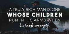 two children standing next to each other near water with the words, a truly rich man is one whose children run in his arms when his heads are empty