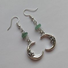 Green Aventurine Moon Earrings Handmade Genuine green aventurine gemstones Each set contains genuine aventurine gemstones which will vary slightly in shape and shade from piece to piece making each set uniquely individual Earring hooks are silver plated and nickel free Complete in gift bag Silver Aventurine Dangle Jewelry, Green Dangle Jewelry With Moon Charm, Handmade Silver Aventurine Jewelry, Aventurine Jewelry, Homemade Earrings, Gender Fluid, Earring Making, Androgynous Fashion, Homemade Jewelry