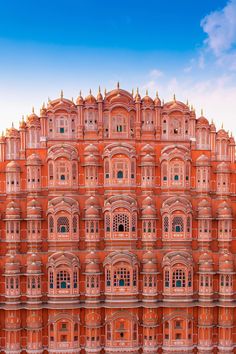 a large orange building with many windows