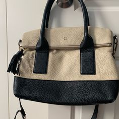 Kate Spade Pebbled Leather. Cream With Black Trim. Excellent Pre-Owned Condition Kate Spade Black Top Handle Satchel, Kate Spade Black Shoulder Bag With Leather Handles, Kate Spade Tote Satchel With Gold-tone Hardware, Kate Spade Shoulder Bag With Leather Handles For On-the-go, Kate Spade Black Bag With Gold-tone Hardware, Satchel Purse, Kate Spade Bag, Black Trim, Black Cream