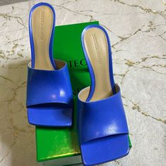 Authentic Bottega Veneta Stretch Sandals/Mules Sz 39 (Runs Small) Color Aquarium Nib Tried On Only Please Ask Any Questions Sales Are Final. Please Submit Only Reasonable Offers Chic Blue Square Toe Mules, Blue Square Toe Mules For Summer, Elegant Blue Square Toe Sandals, Blue Square Toe Evening Sandals, Blue Leather Heels With Square Toe, Blue Mules With Sculpted Heel For Party, Blue Mules With Deep Heel Cup And Open Heel, Blue Formal Sandals With Square Toe, Blue Party Mules With Sculpted Heel