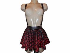 Mini skater skirt consists of 2 layers of latex, the top layer of mesh latex made of liquid vegan latex, the bottom layer is made of 0.40 mm standard latex The suspenders are adjustable and removable, they are attached to the skirt with the help of clips The skirt is approximately 30 cm long, but can also be made longer (contact us after ordering) Shown here in black mesh latex with symmetrical motifs and bottom layer of red 0.40 mm thick standard latex. Because we make our own mesh latex, it is Mini Skater Skirt, Colored Contacts, Black Mesh, Suspenders, Skater Skirt, Belgium, The Help, Womens Skirt, Bathing Beauties