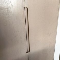 a white refrigerator freezer sitting inside of a kitchen